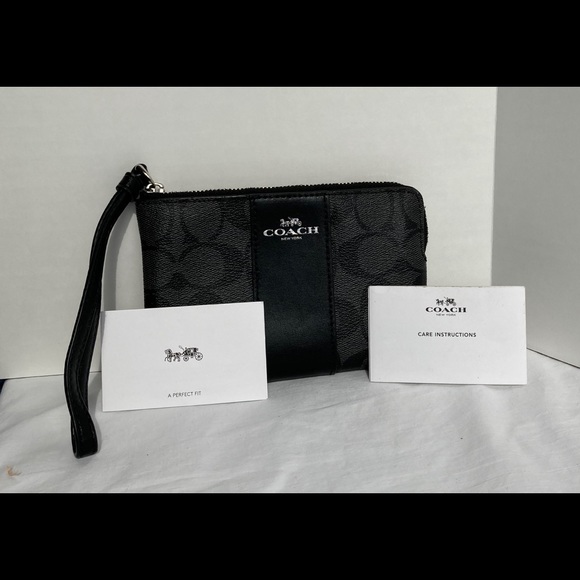 Coach Handbags - Coach Black / Grey Corner Zip Signature Wristlet.
